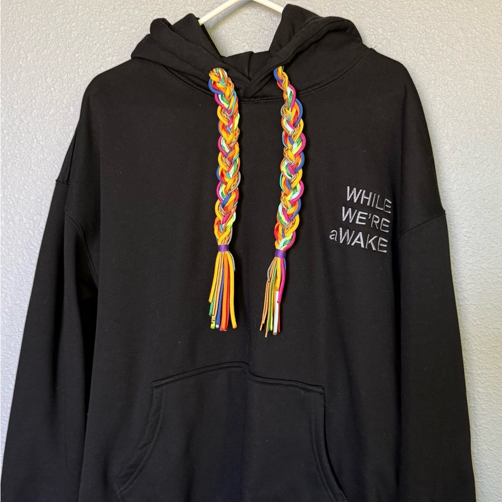 While We're Awake Black Heavyweight Hoodie with Rainbow Braided Drawstrings